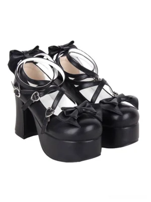 Maid lolita platform shoes front three-quarter view featuring round toe design with black satin bow embellishments and heart-shaped buckle details