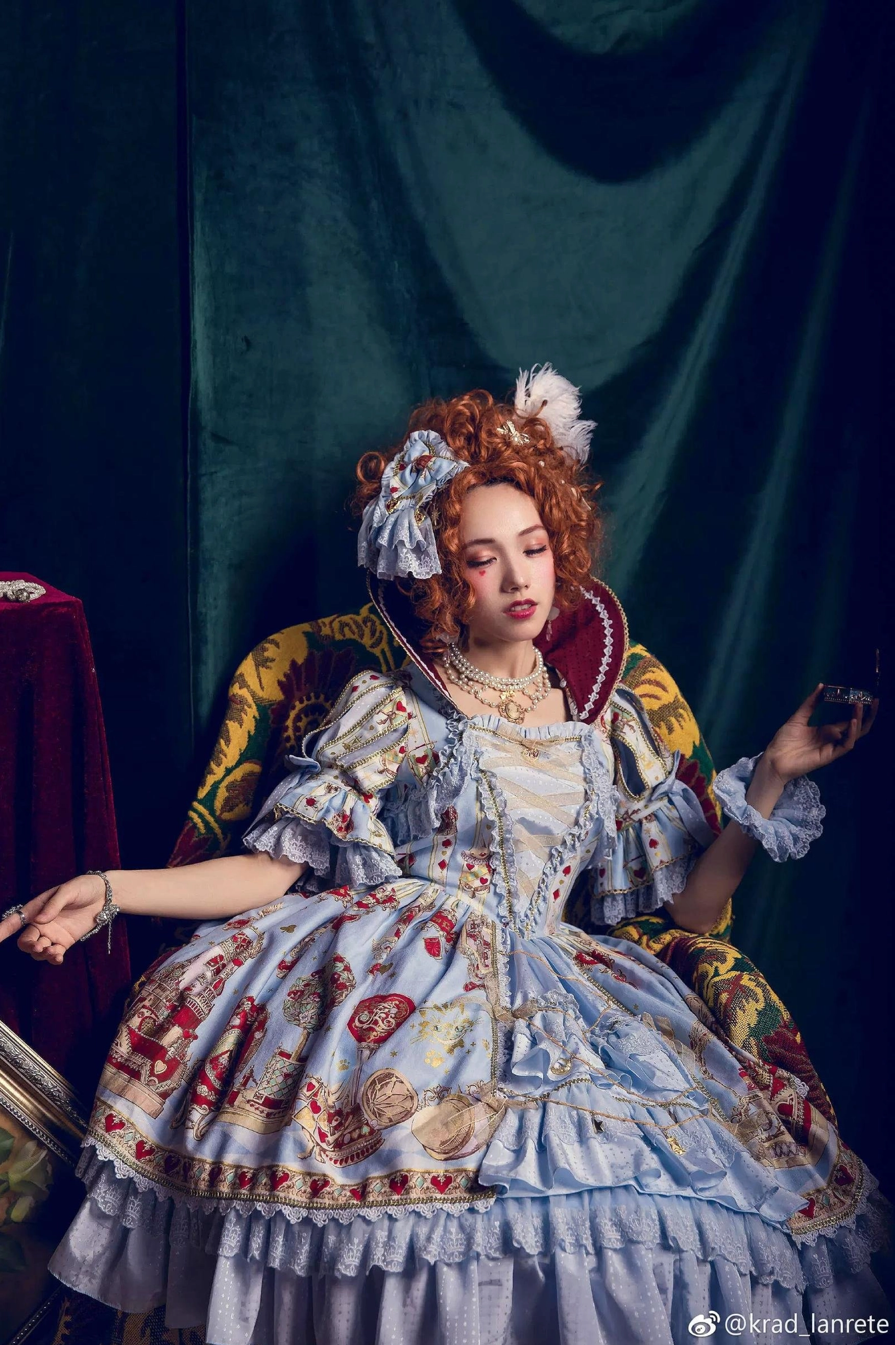 Retro court lolita girl in full-body seated portrait wearing gorgeous royal print formal lolita dress with Manor Ball II pearl necklace and bracelet set dark aristocratic setting