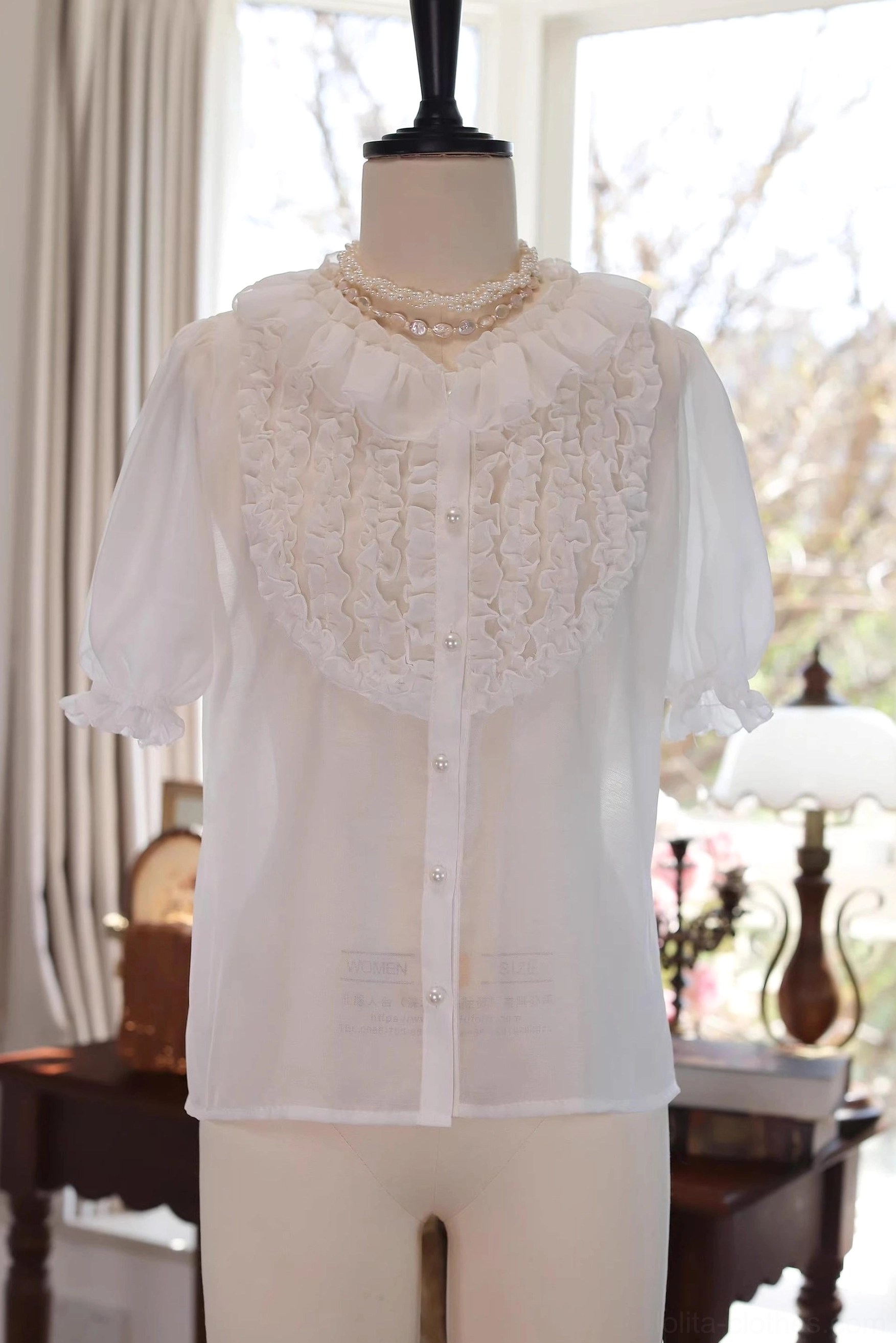 Marguerite floral ruffle classic lolita short sleeve chiffon blouse milky white front view dress form mannequin delicate lace bib yoke pearl buttons