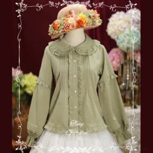 Matcha green long-sleeve Lolita cotton blouse featuring ruffled Peter Pan collar and ruffle-trimmed button placket, modeled with colorful floral wreath