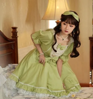 Matcha green classic lolita OP dress with puff sleeves and square neckline lace trim half-body squatting front view vintage bedroom