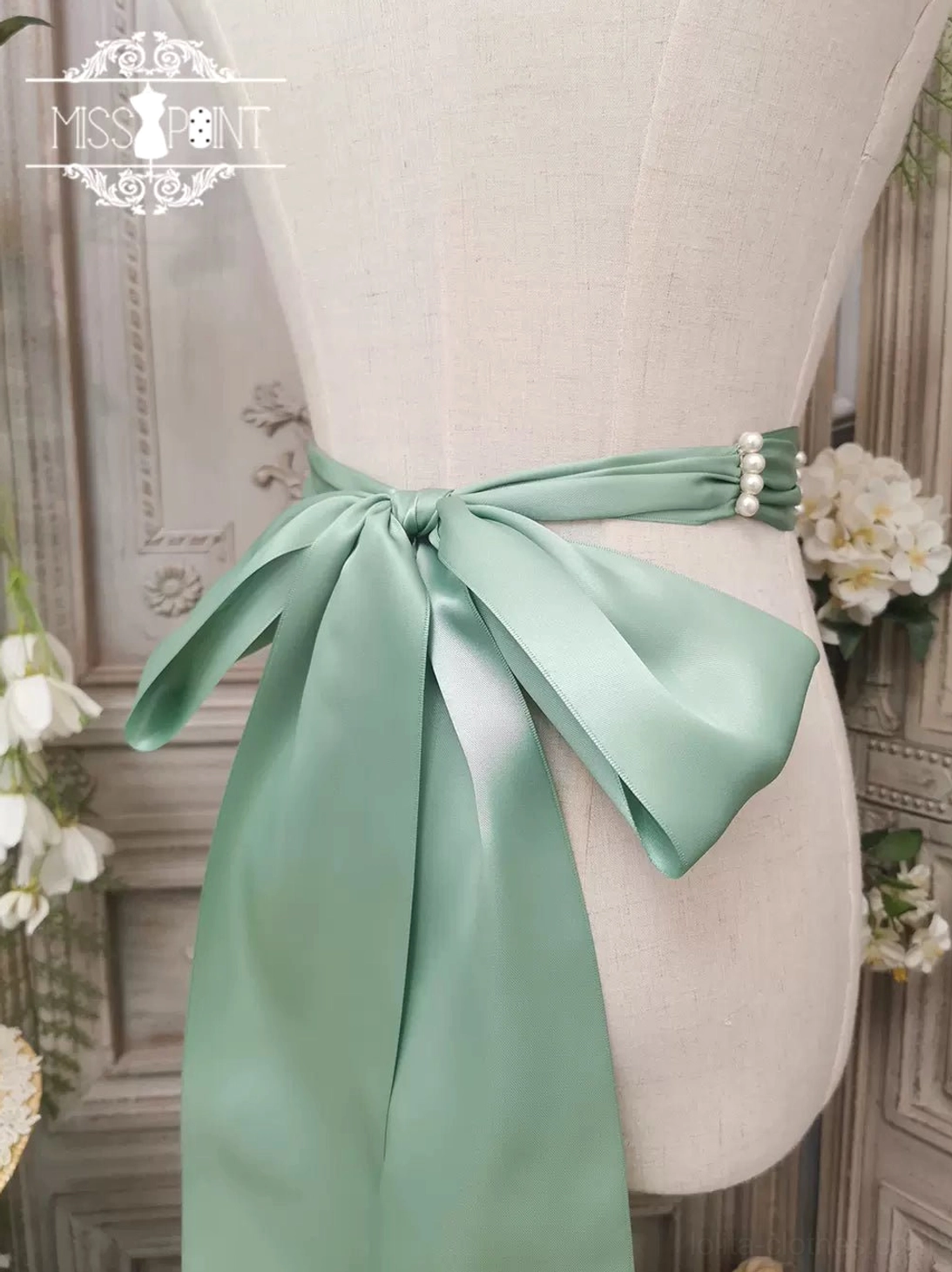 Matcha lolita ribbon beaded belt variant showing handcrafted pearl embellishments and traditional floral weaving patterns
