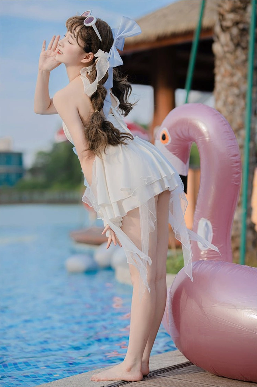 Mermaid lolita swimwear side back standing lakeside pool flamingo float asymmetrical tulle hem backless silhouette matching hair bow accessories fantasy