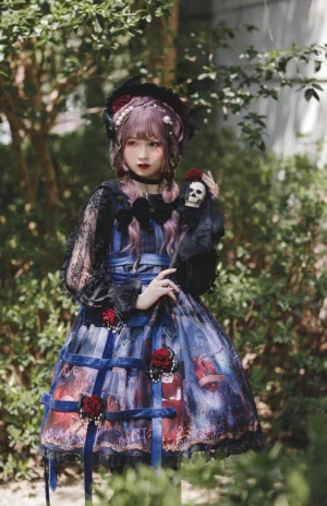 Midnight Magic Gothic Lolita JSK Dress - Dark Blue Palace Print Jumper Skirt with Purple-Haired Model in Outdoor Greenery Setting, Featuring Blue Ribbon Straps and Red Rose Decorations