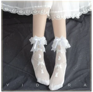 Milk candy rabbit white lolita ankle socks flat lay view showing detachable lace ruffle cuff with satin bow and bunny jacquard patterns on sheer fabric