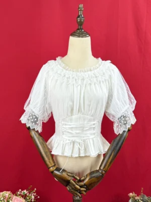 Classic Lolita short-sleeve chiffon blouse in milky white with lace-trimmed puff sleeves, pleated bodice, ruffled hem, and adjustable drawstring waist displayed on dress form from front view