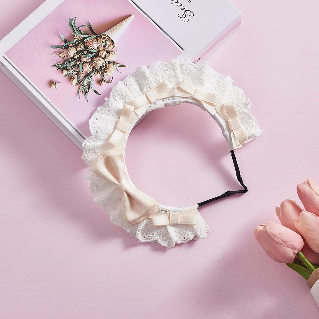 Milky white lolita lace KC headband flat lay view with elegant cream satin bows and delicate ruffled lace trim for classic lolita aesthetics