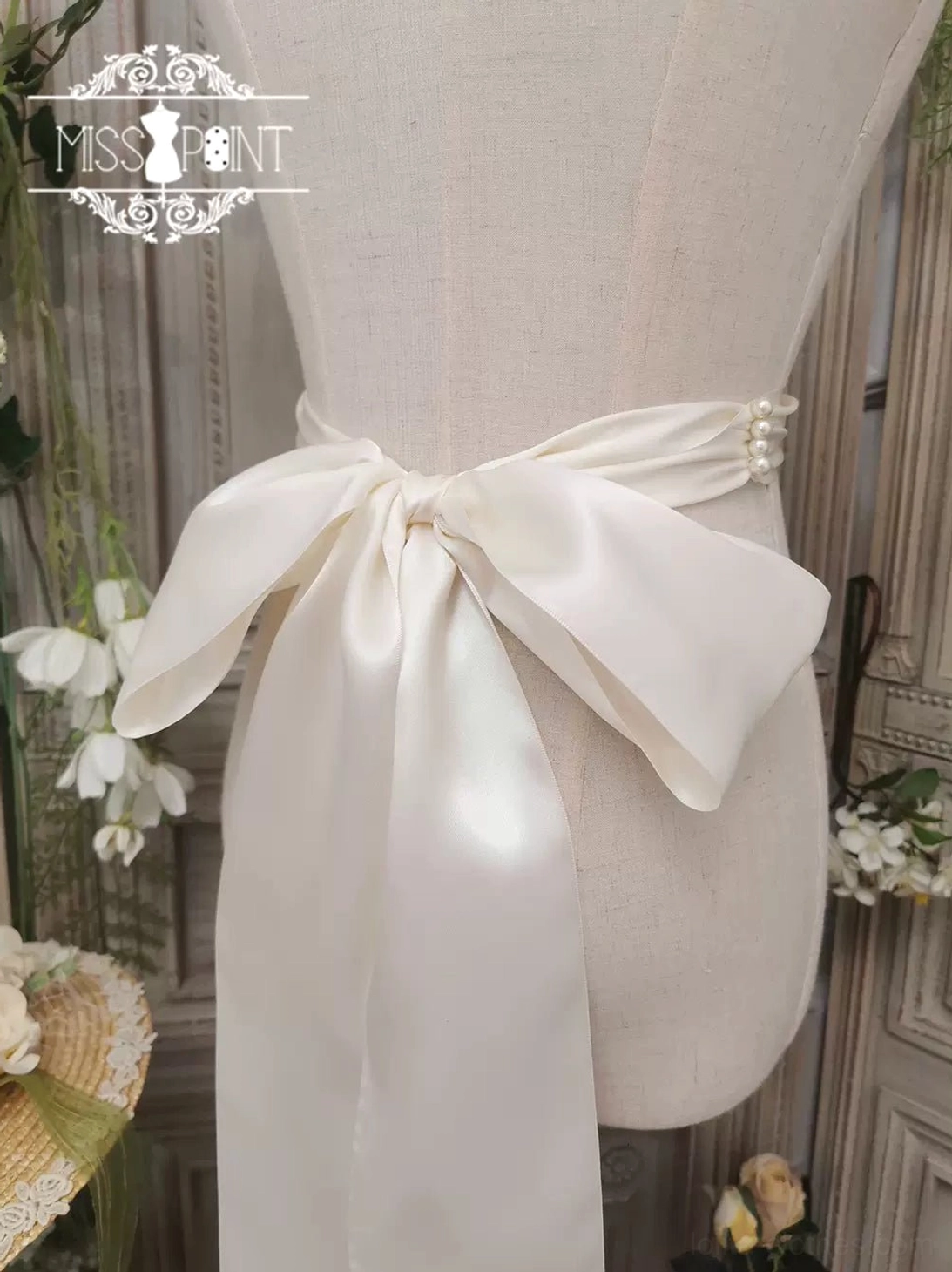 Milky white lolita ribbon beaded belt displaying handmade construction with pearl details and classic floral embroidery