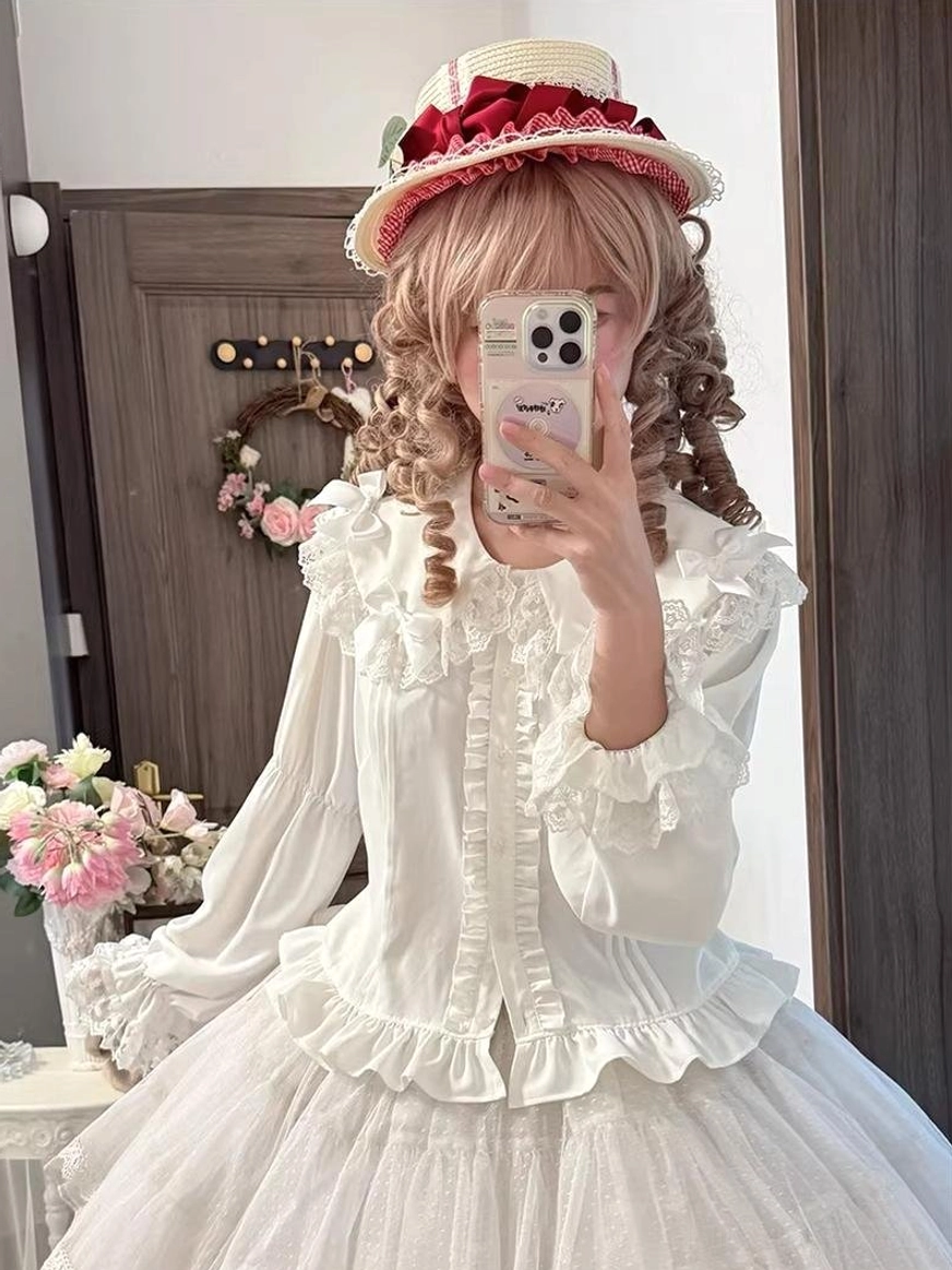Over-the-shoulder mirror selfie of model wearing milky white Peter Pan collar sweet Lolita blouse with ruffled hem, paired with red ribbon straw hat and full lolita dress ensemble
