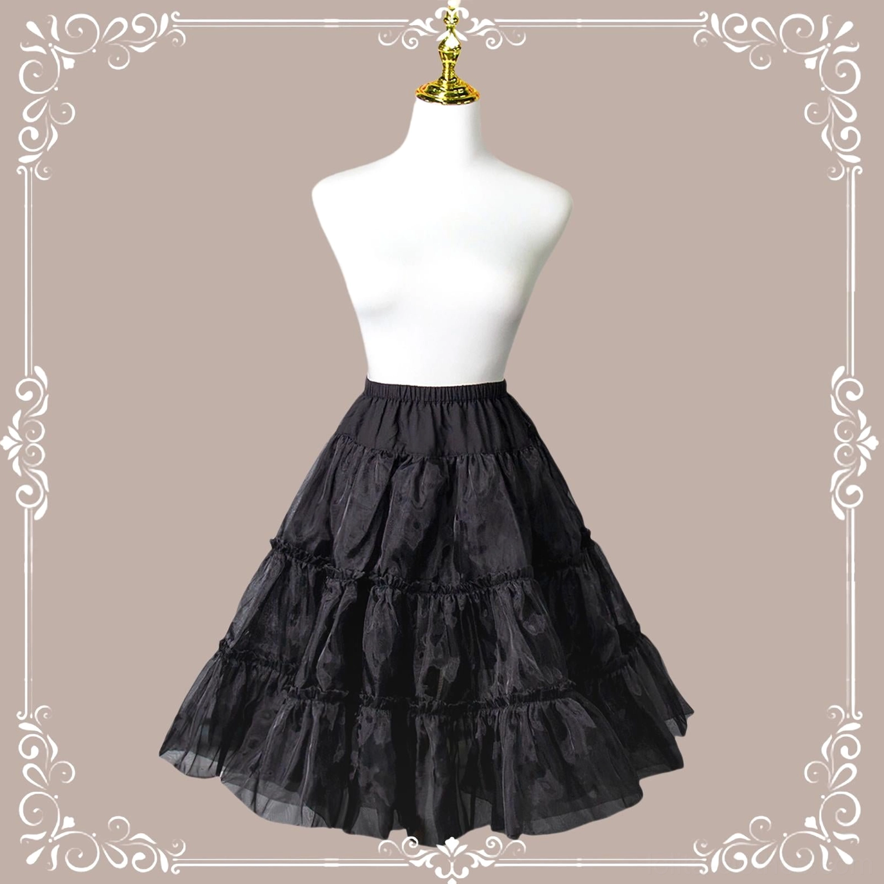 Black tiered Lolita petticoat front full view on dress form against vintage ornate frame patterned backdrop showing fluffy tulle layers