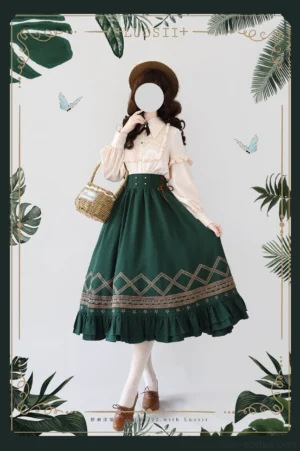 Vintage solid color Lolita A-line two-piece skirt set with geometric embroidery and ruffled hem displayed on mannequin with tropical plant backdrop