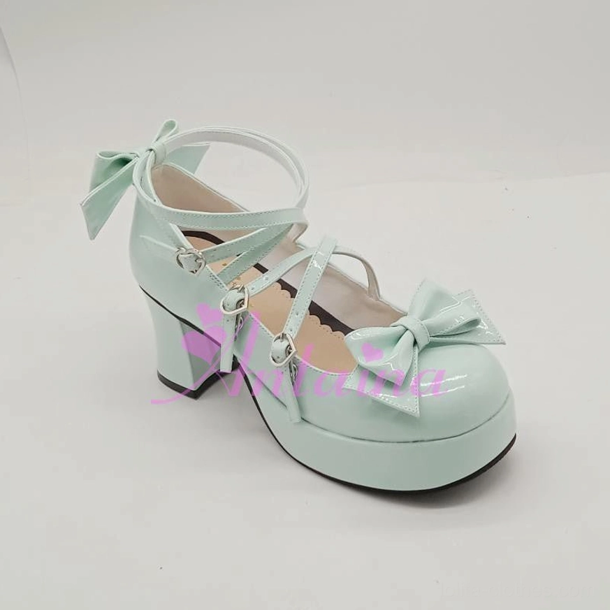Mint green glossy sweet Lolita Mary Jane platform shoe showcasing lustrous finish and classic bow strap details for bright cheerful coordinates