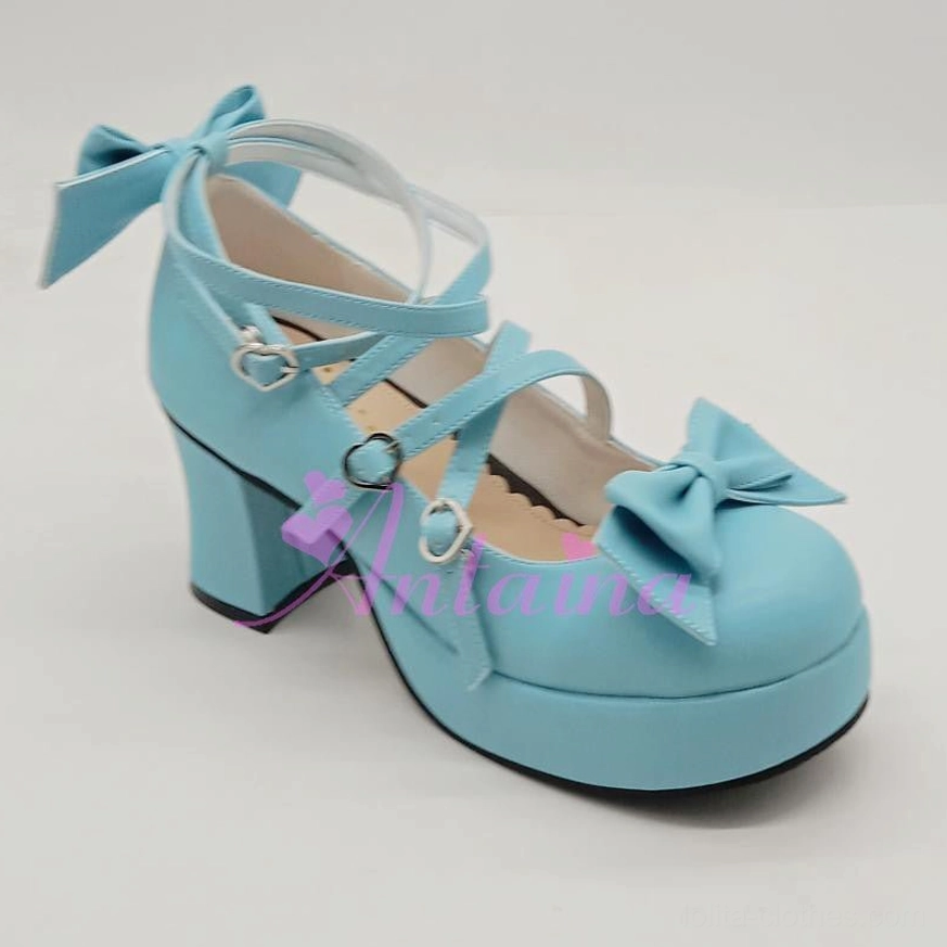 Mint green shining Lolita Mary Jane platform shoe in convention setting showing real-world wear and styling with other Lolita fashion elements
