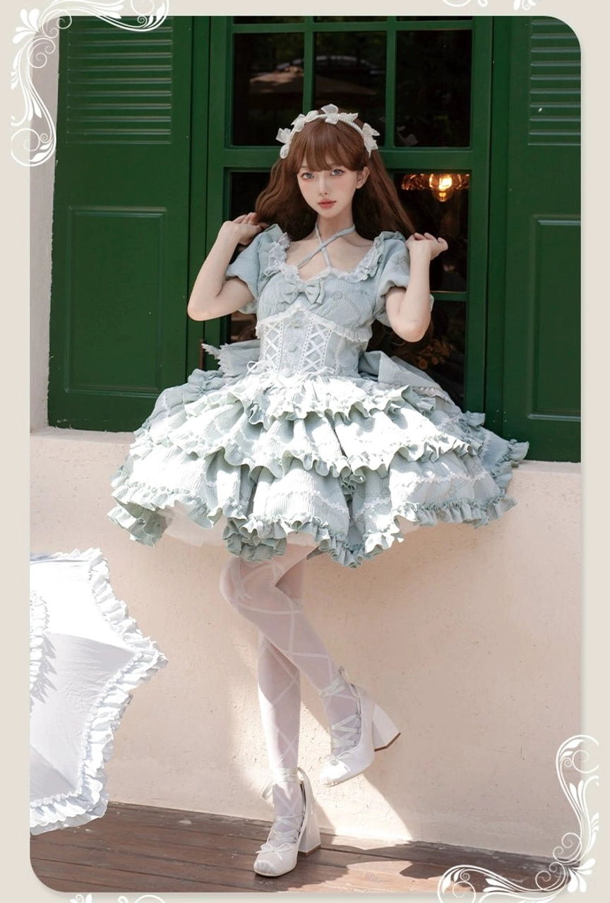 Mint sweet lolita princess one-piece dress three-quarter view villa window oversized rear bow multi-tiered ruffle texture