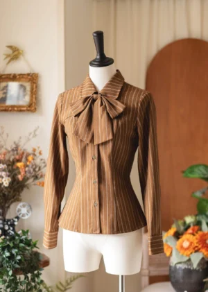 Mocha brown vertical striped classic Lolita blouse with detachable bow tie, front full view on dress mannequin, vintage home setting