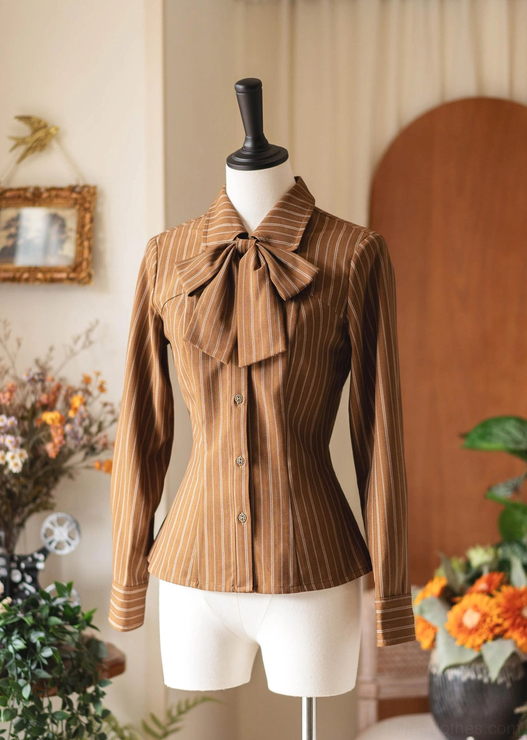 Mocha brown vertical striped classic Lolita blouse with detachable bow tie, front full view on dress mannequin, vintage home setting