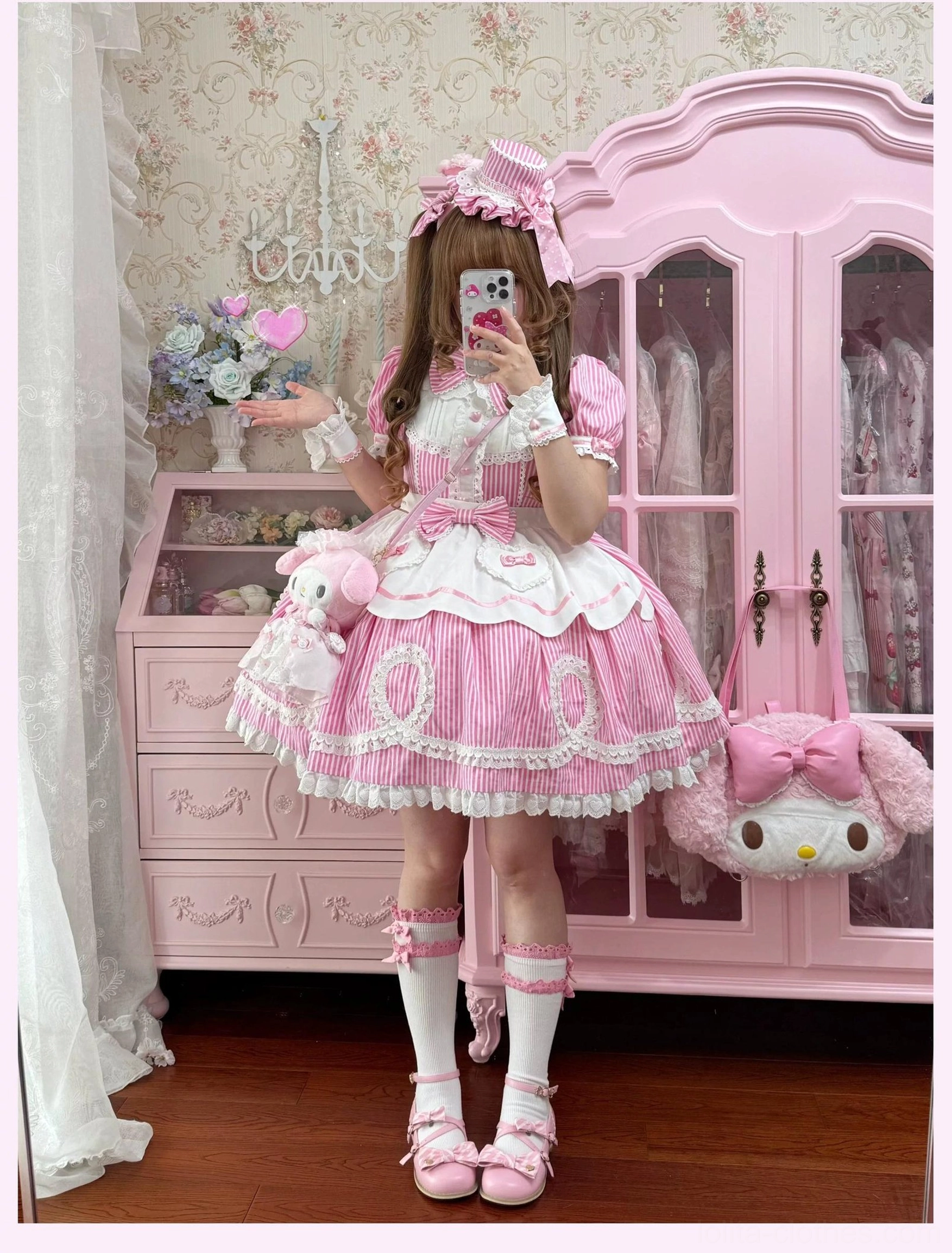 Model in red polka dot lolita OP dress with Mary Jane shoes showing recommended footwear pairing