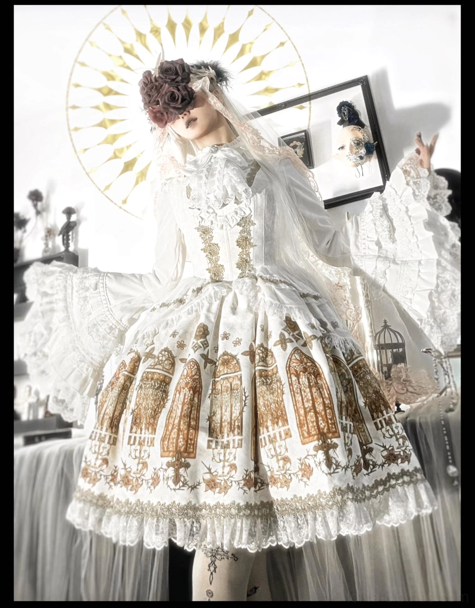 Model wearing white gothic lolita stained glass print full set large ruffled trumpet sleeves gold embroidery studio halo