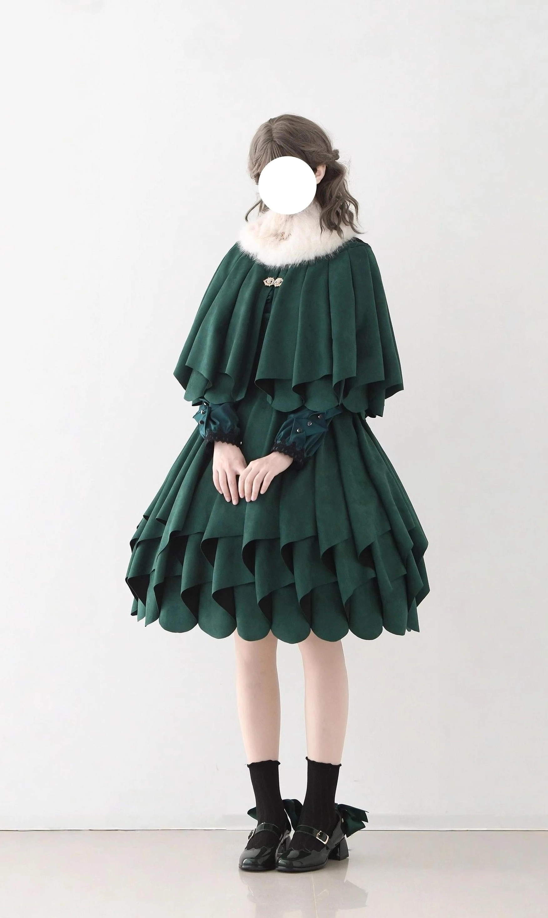 Classic Lolita skirt and detachable cape set in deep green plush fabric with multi-layer ruffled design, front view, studio photography