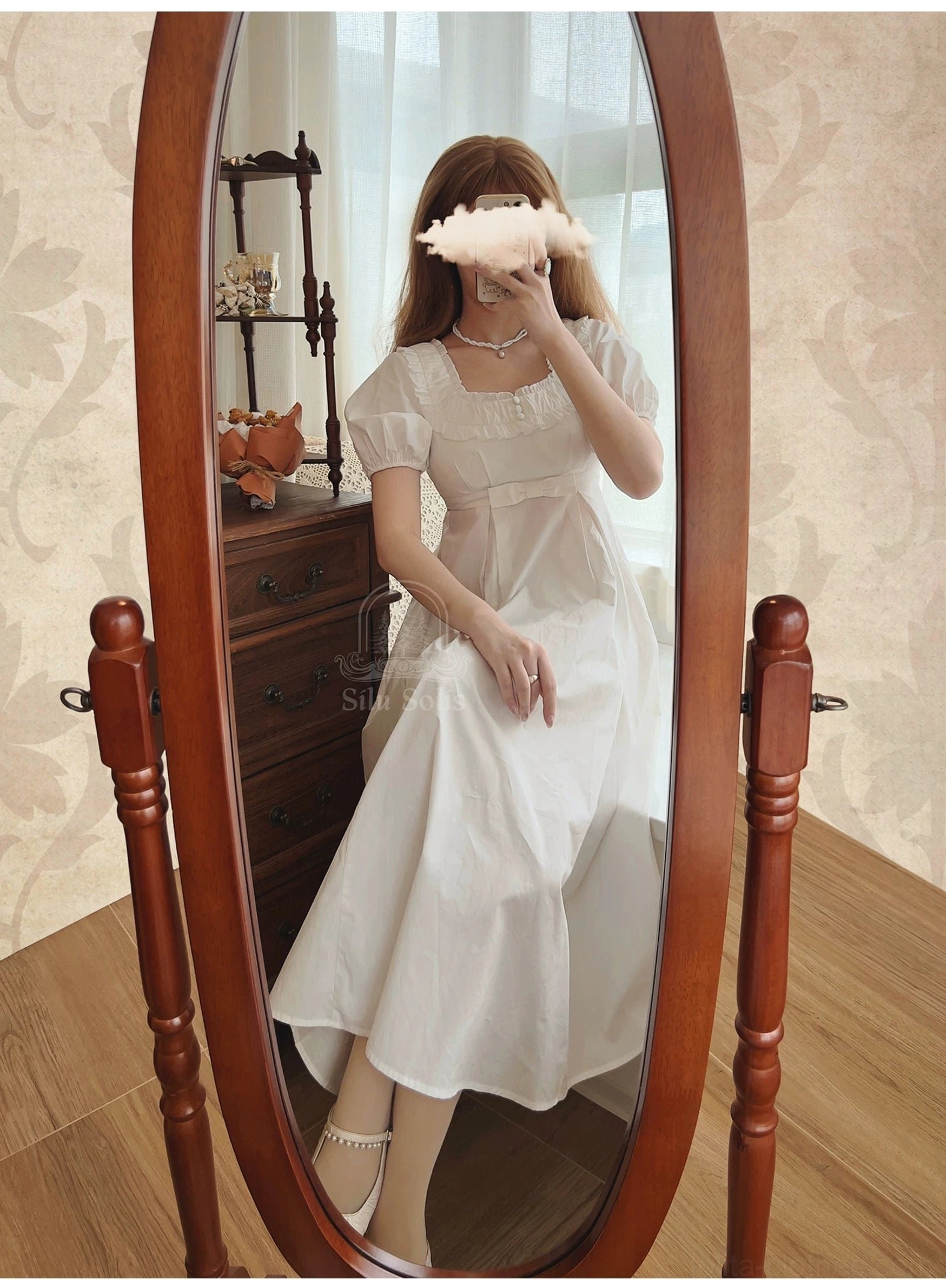 Lolita country OP dress interior construction detail showing seams and built-in bra pad integrated support