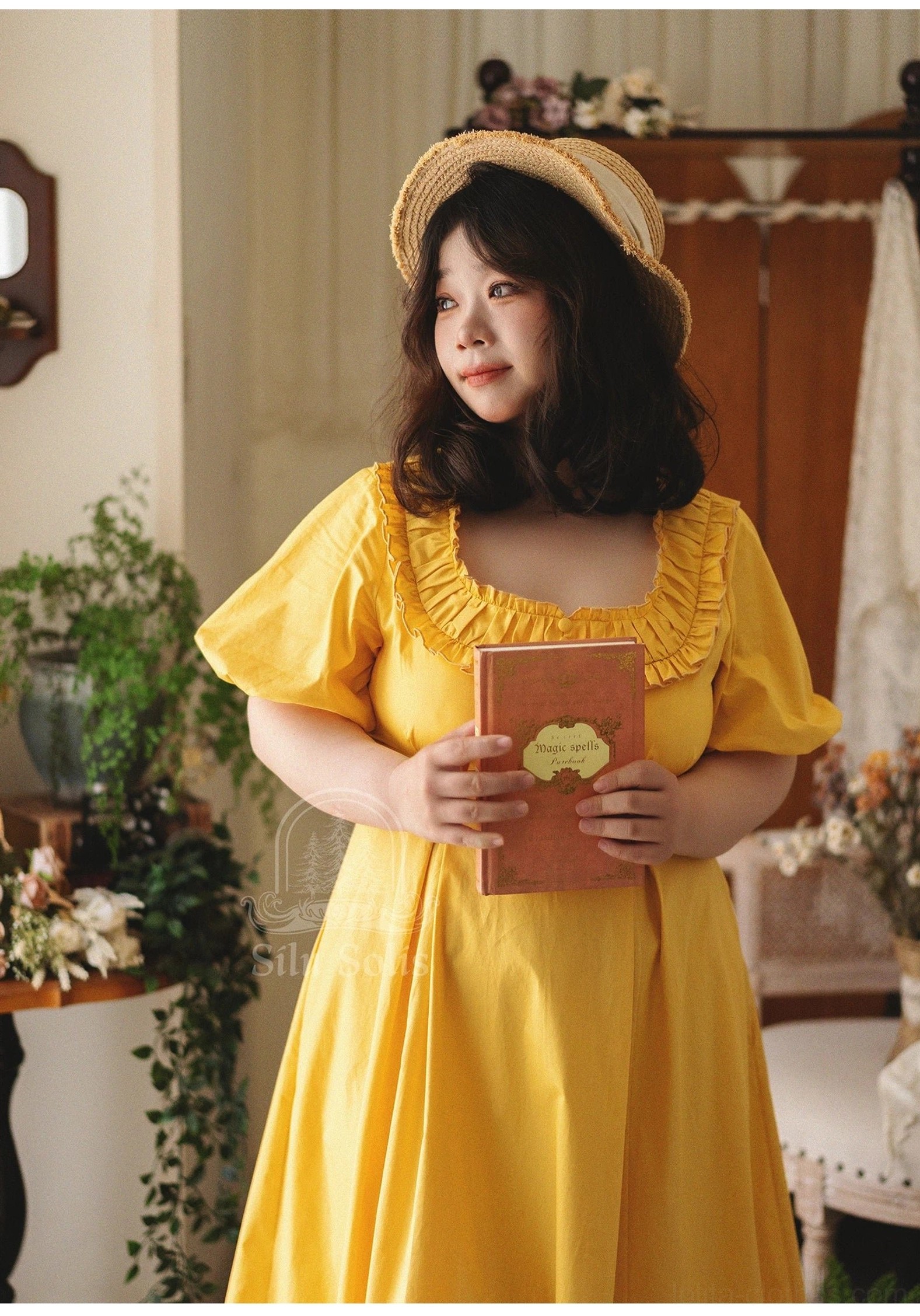Empire waist lolita one-piece dress showing constructed waist tie feature and ankle-length silhouette