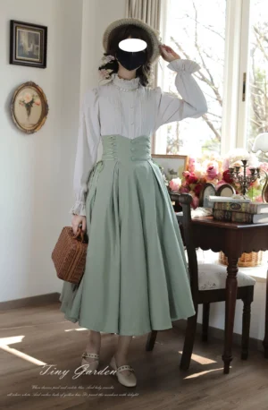 Morning Mist Classic Lolita A-line skirt vintage high-waist design sage green midi skirt with white ruffled stand-collar blouse indoor vintage dining room full body shot