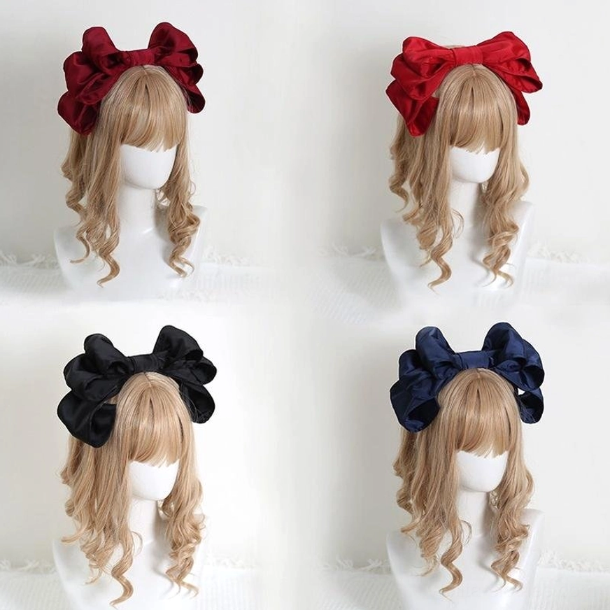 Multi-color satin bow Lolita headbands displayed on four mannequins showing red black and navy blue color options all with glossy satin layered bows