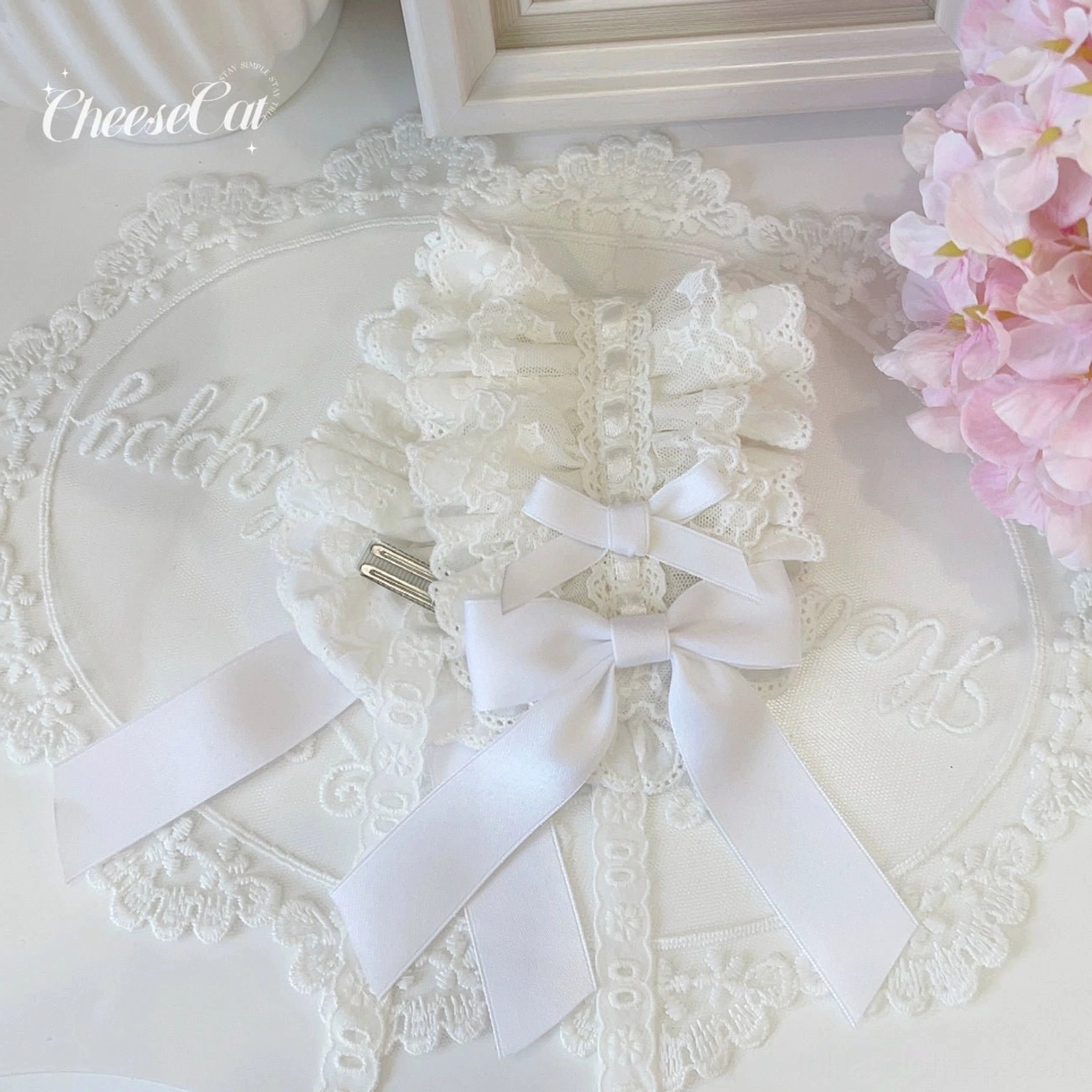 Multiple sweet Lolita headbands with ruffled lace trim and satin bows displayed together showcasing the complete color collection