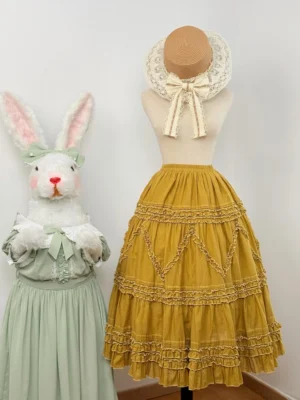 Mustard yellow tiered ruffle lolita underskirt cotton petticoat with layered volume A-line silhouette displayed on mannequin