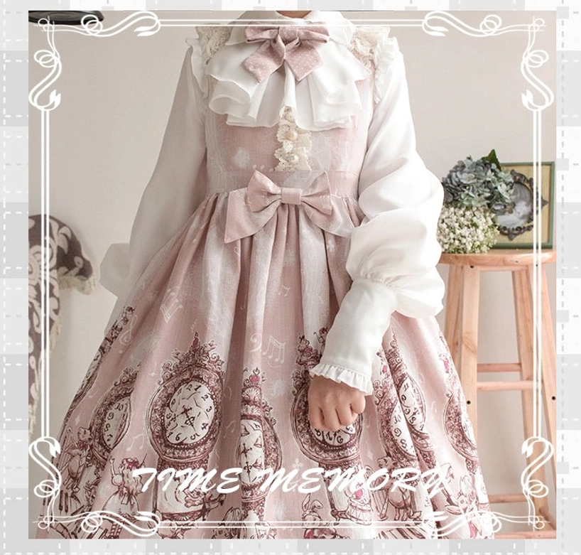 Mutton sleeve Lolita blouse detail shot showing pleated ruffles on chest and cuffs with puff sleeve construction