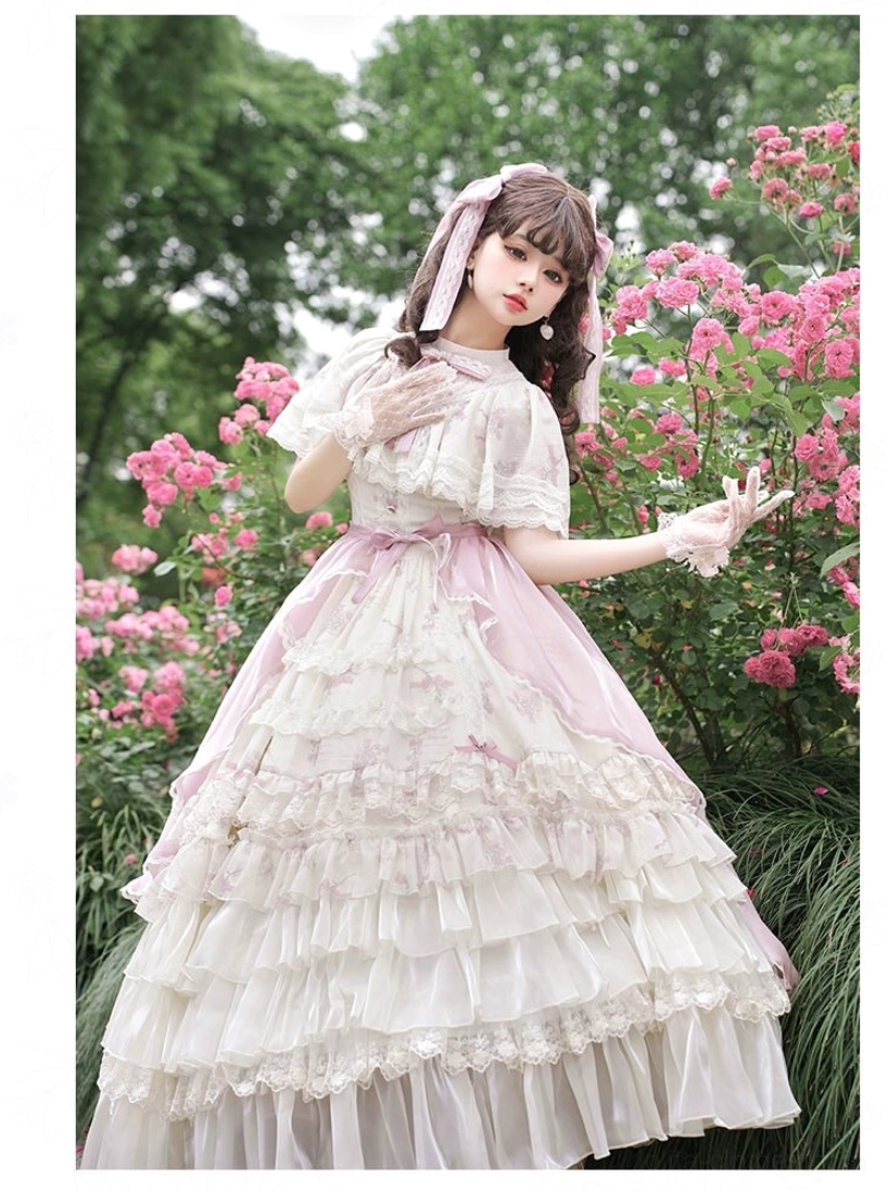 Edwardian style lolita OP dress three-quarter front shot cream skirt soft pink side panels bow neckline pink hair bows lace gloves
