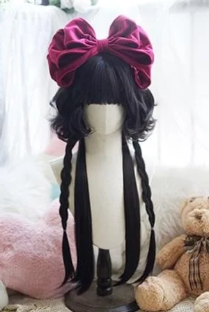 Natural black curly lolita wig with dual braids and large burgundy velvet hair bow, close-up front view of intricate design details