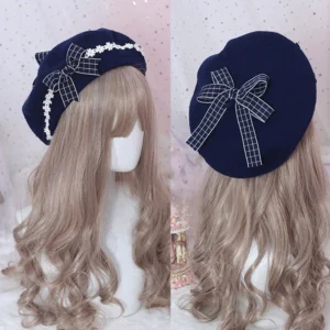 Navy blue grid plaid woolen lolita beret with white lace edging and navy plaid ribbon bow, showing front mannequin view and flat lay back detail