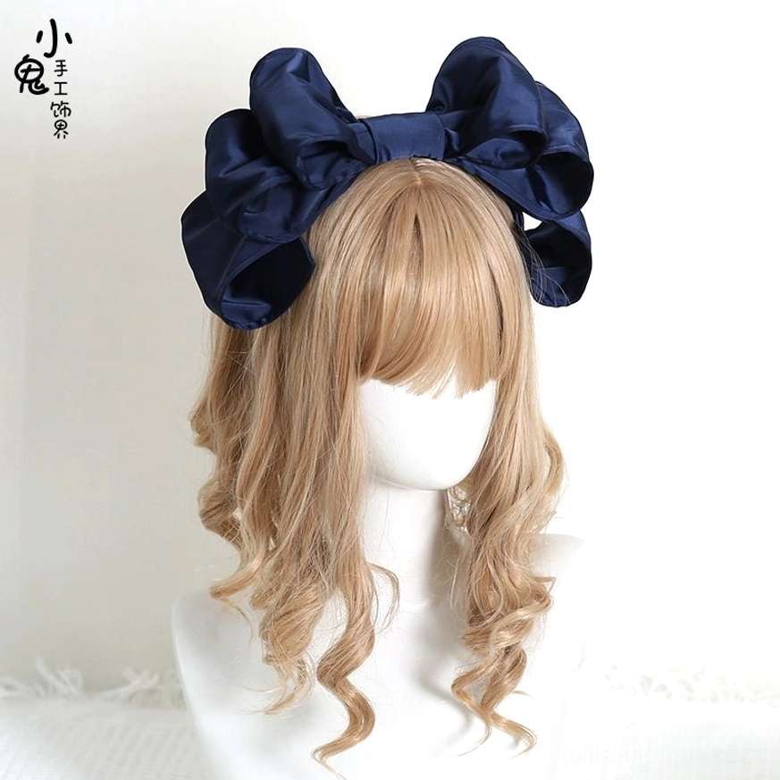 Navy blue deep glossy satin oversized bow Lolita hair clip frontal close-up on mannequin blonde wig layered 3D bow shape professional styling