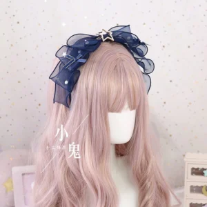 Navy blue star pearl organza bow lolita hair clip KC headdress front three-quarter view on mannequin with long wavy pink hair