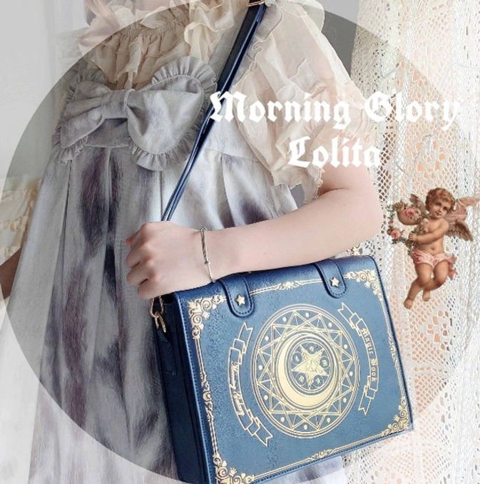 Navy blue structured magic book lolita crossbody clamshell bag matching dark leather with gold foil celestial patterns for gothic lolita