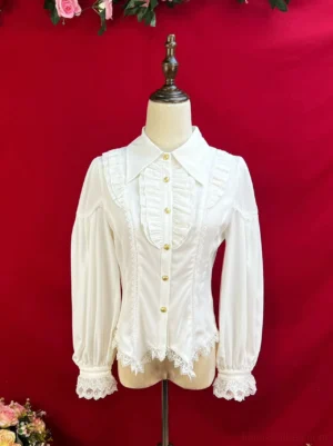 Night Banquet classic lolita blouse in cream white with tiered ruffles, pointed collar, and gold buttons, front view on mannequin