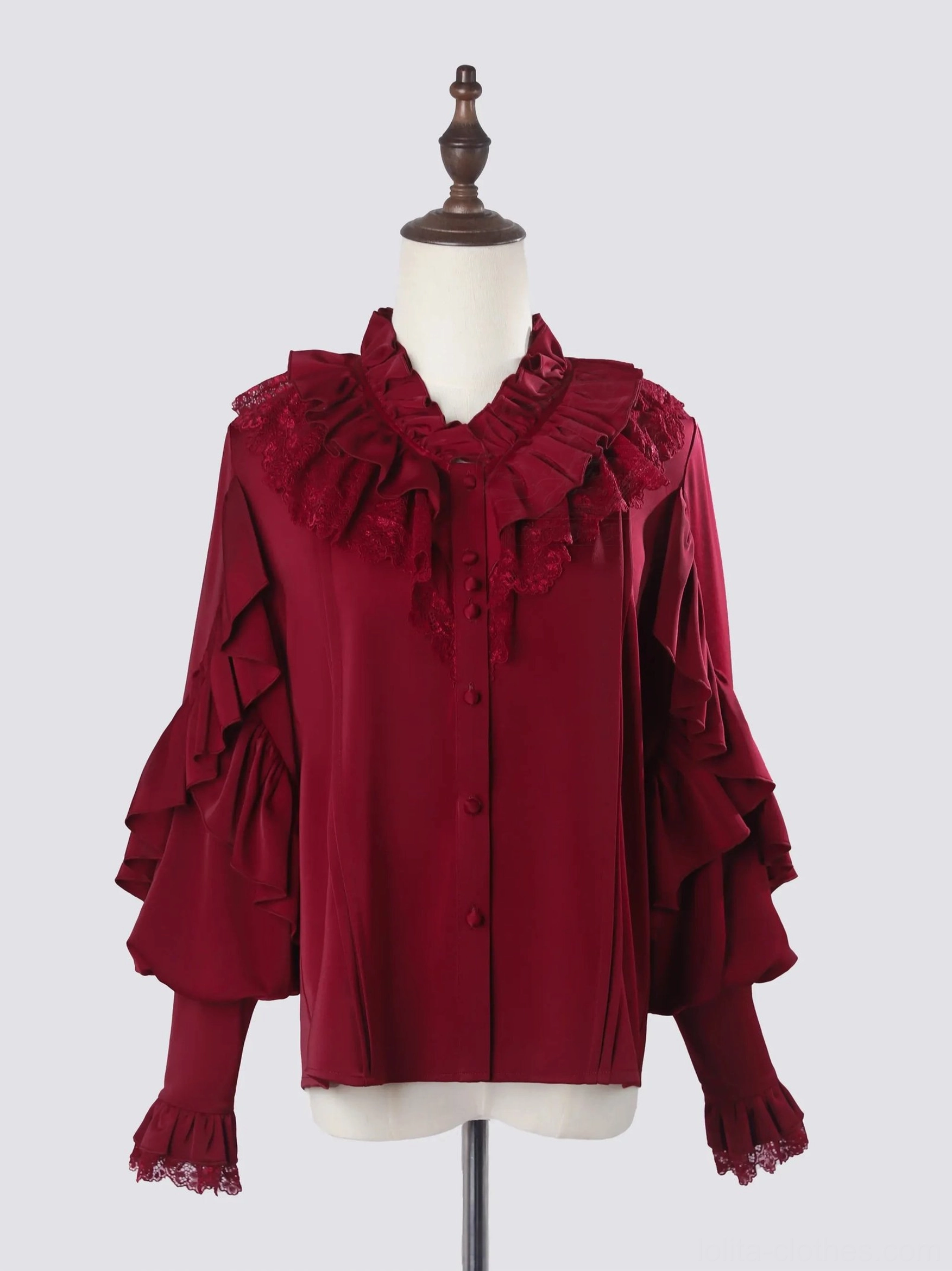 Burgundy wine red ouji lolita satin blouse flat lay display layered ruffled lace collar long ruffled sleeves with lace cuffs front button closure dress form