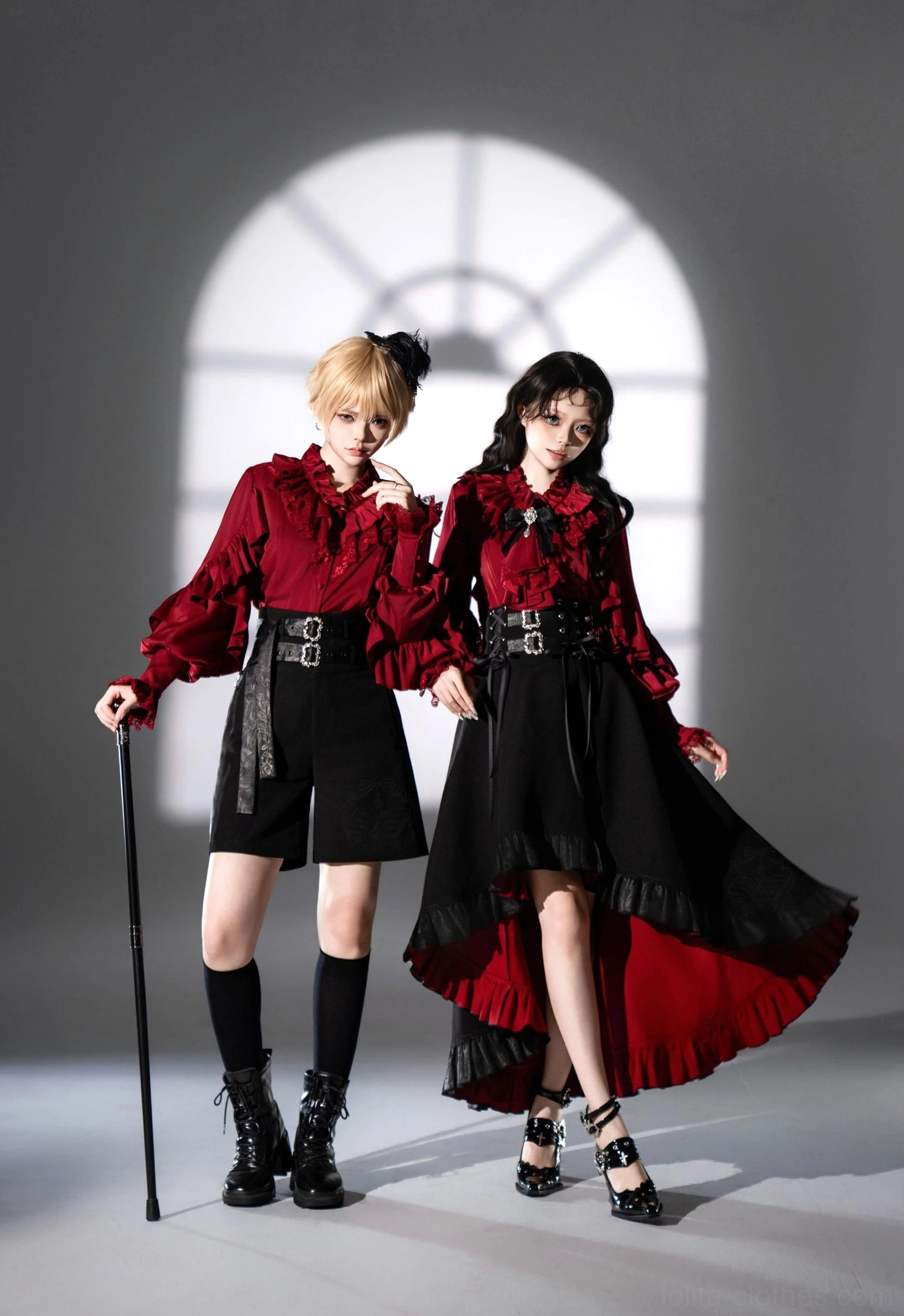 Ouji lolita blouse and skirt three-quarter front view wine red ruffled blouse one model with black shorts and cane one model with high-low mermaid skirt