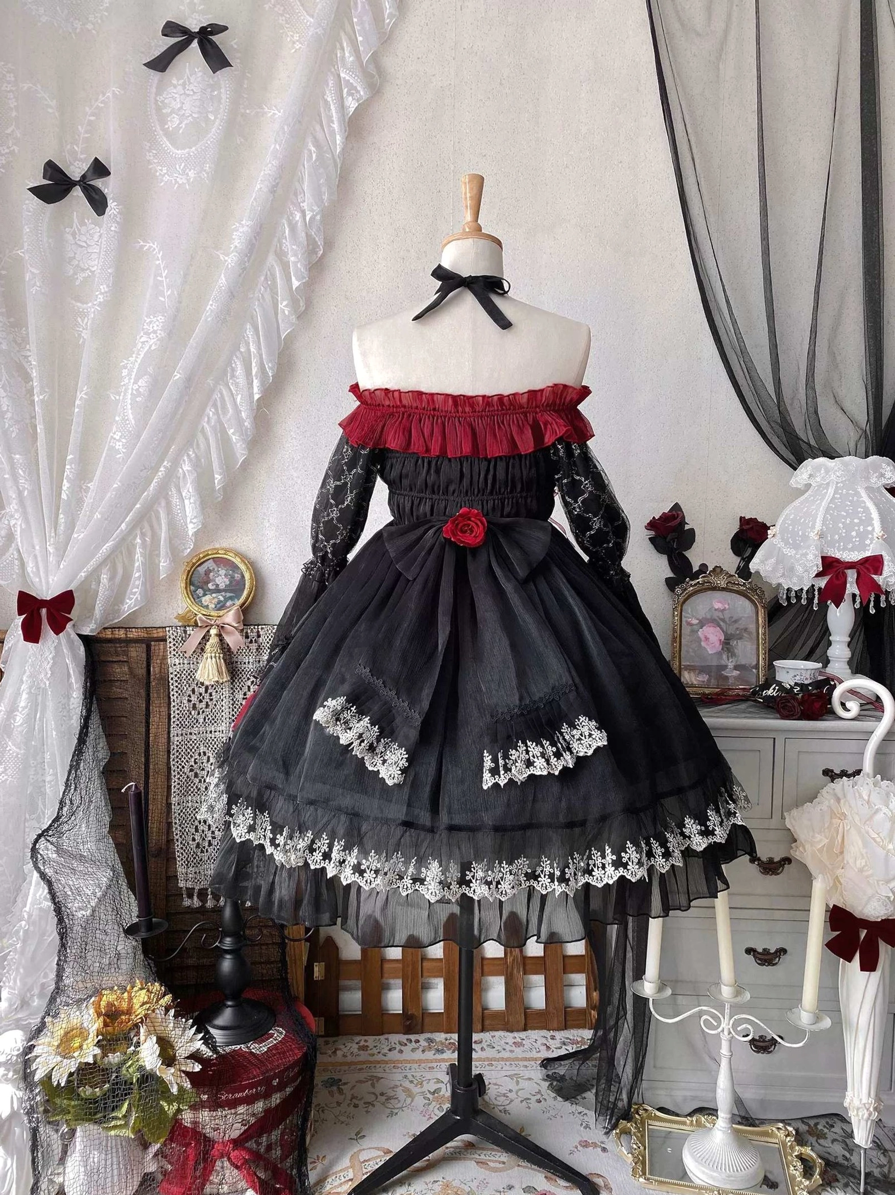 Black and red gothic lolita OP dress with all accessories coordinated showing complete ensemble including veil, choker, waist tulle, and back bow