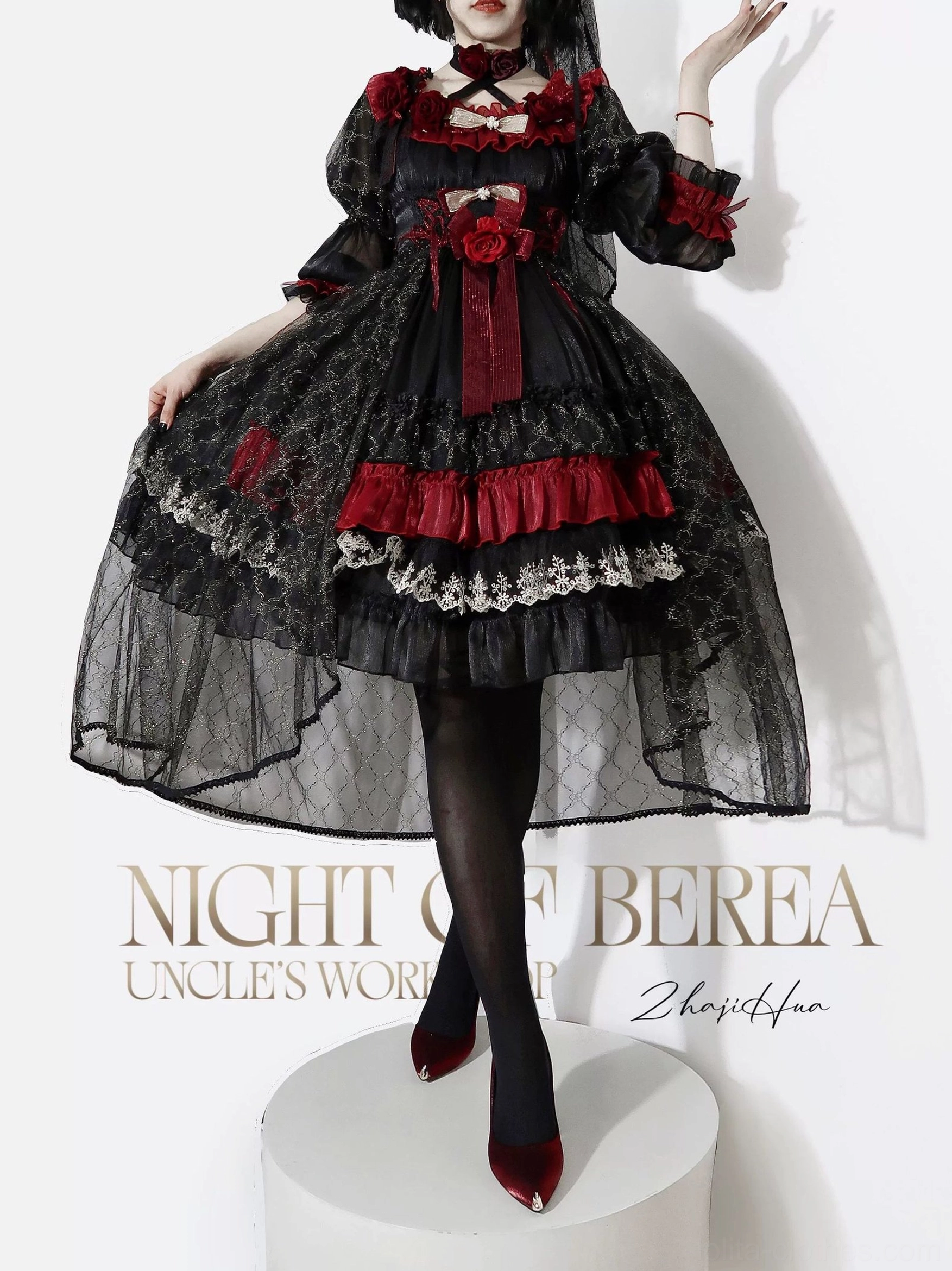 Night of Berea gothic lolita OP dress back view showing shirring detail, matching waist bow, and layered skirt structure with red and black color coordination