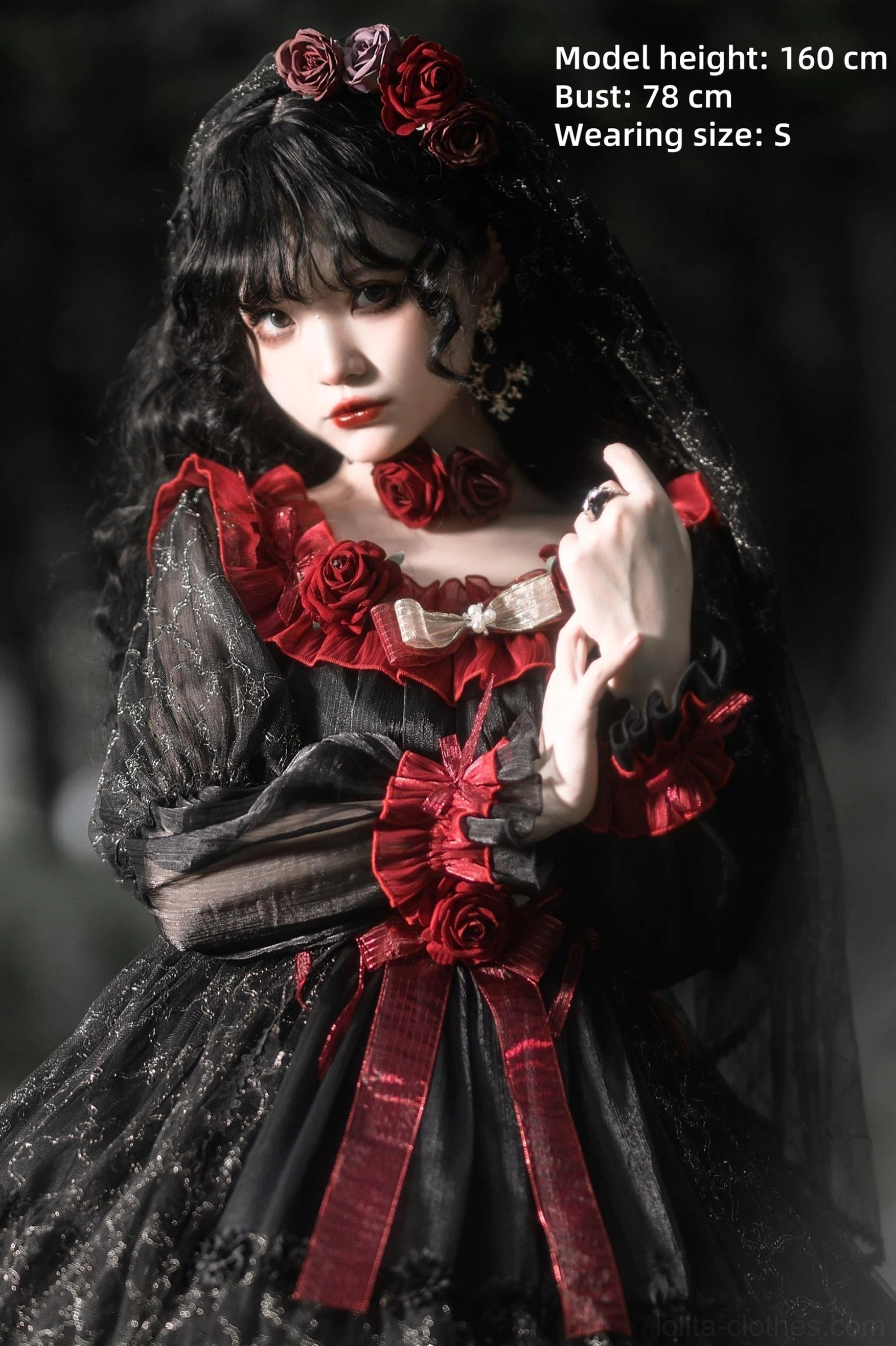 Close-up half-body portrait of Night of Berea gothic lolita dress showing red rose choker, delicate lace sleeves, front ribbon waist bow on model height 160cm bust 78cm wearing size S