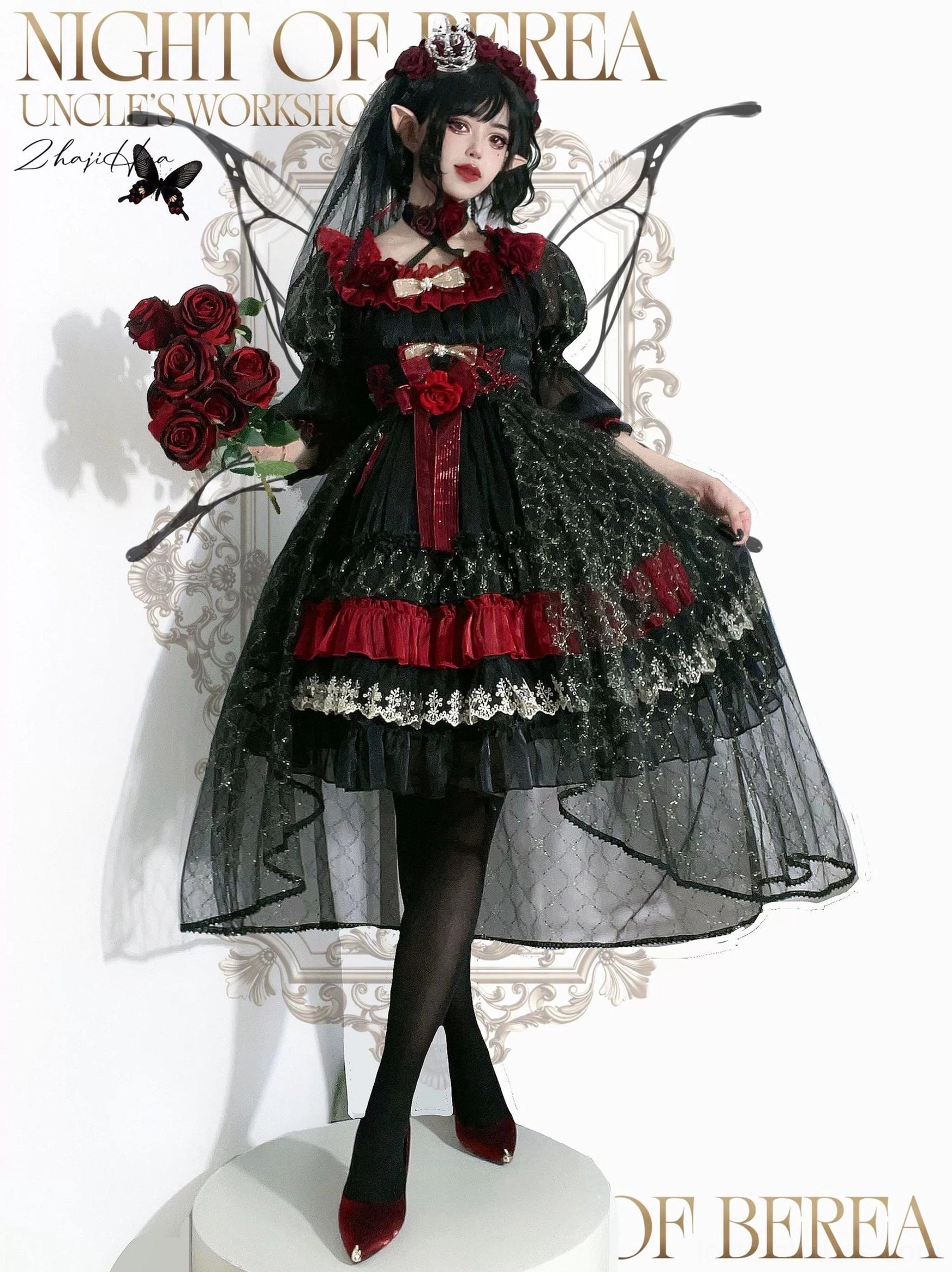 Night of Berea gothic lolita OP dress full-body standing display on studio stand with high-low skirt hem, matching veil, fairy wings, and chest rose decorations