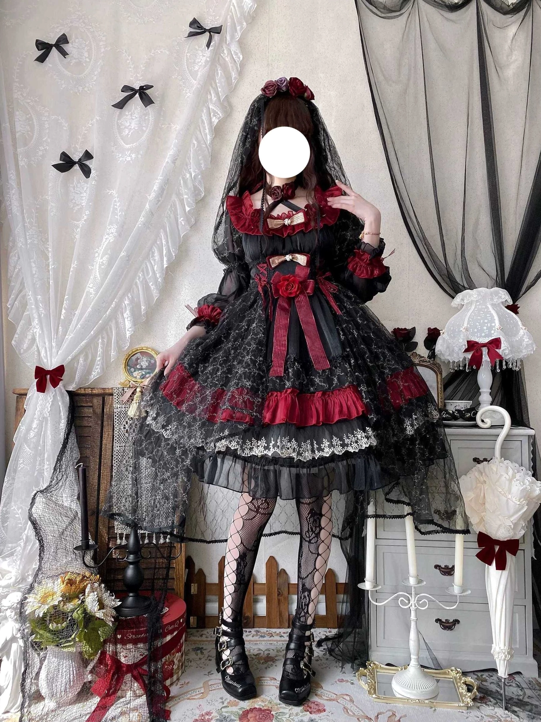 Night of Berea gothic lolita OP dress three-quarter body view displaying full skirt volume, tiered ruffles, and red accent placement throughout the garment