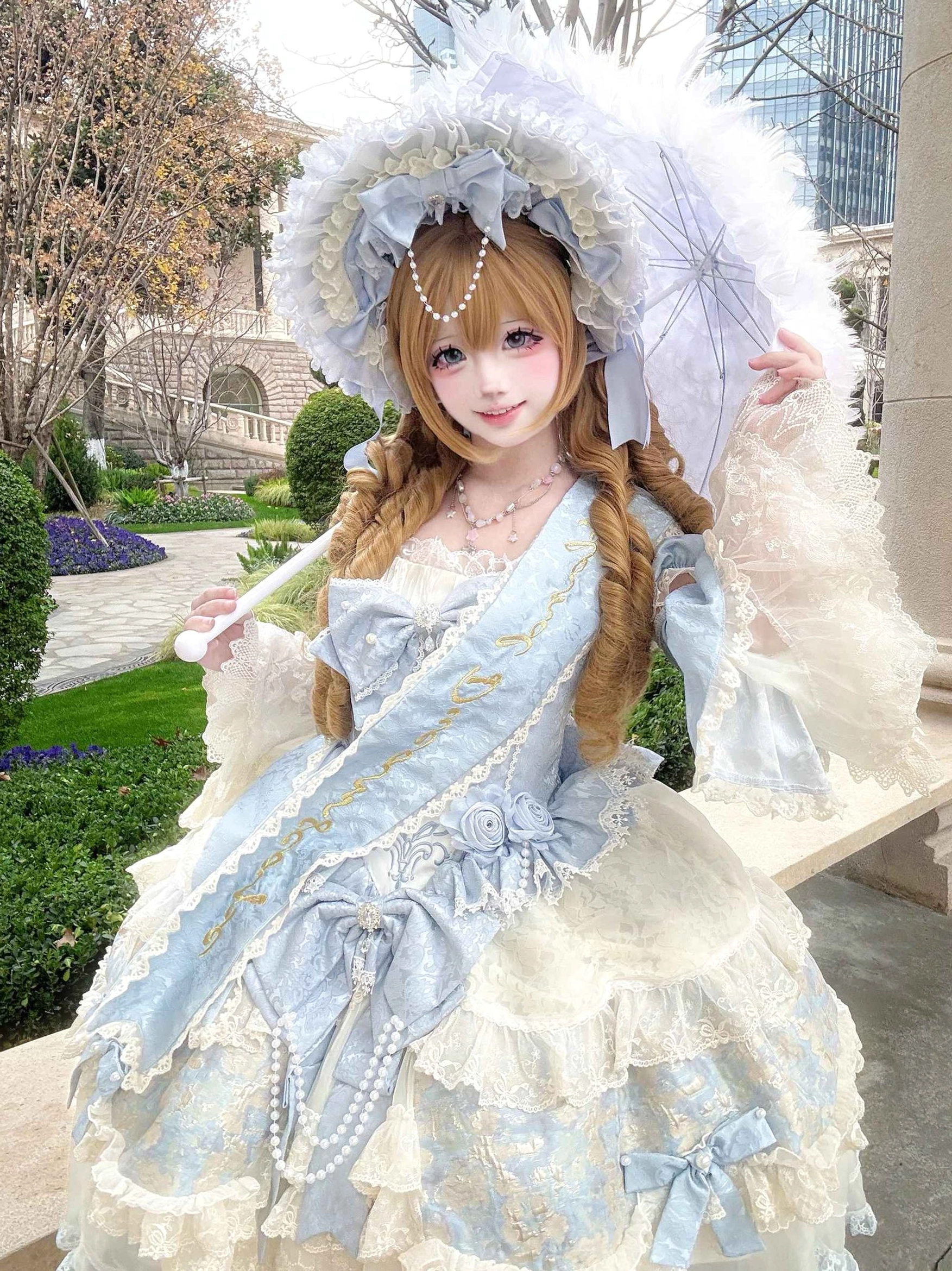 Noble-style Lolita OP dress half-body side portrait blonde twin-tails girl outdoor park pathway feather-decorated bonnet sheer ruffle sleeves embroidered bodice