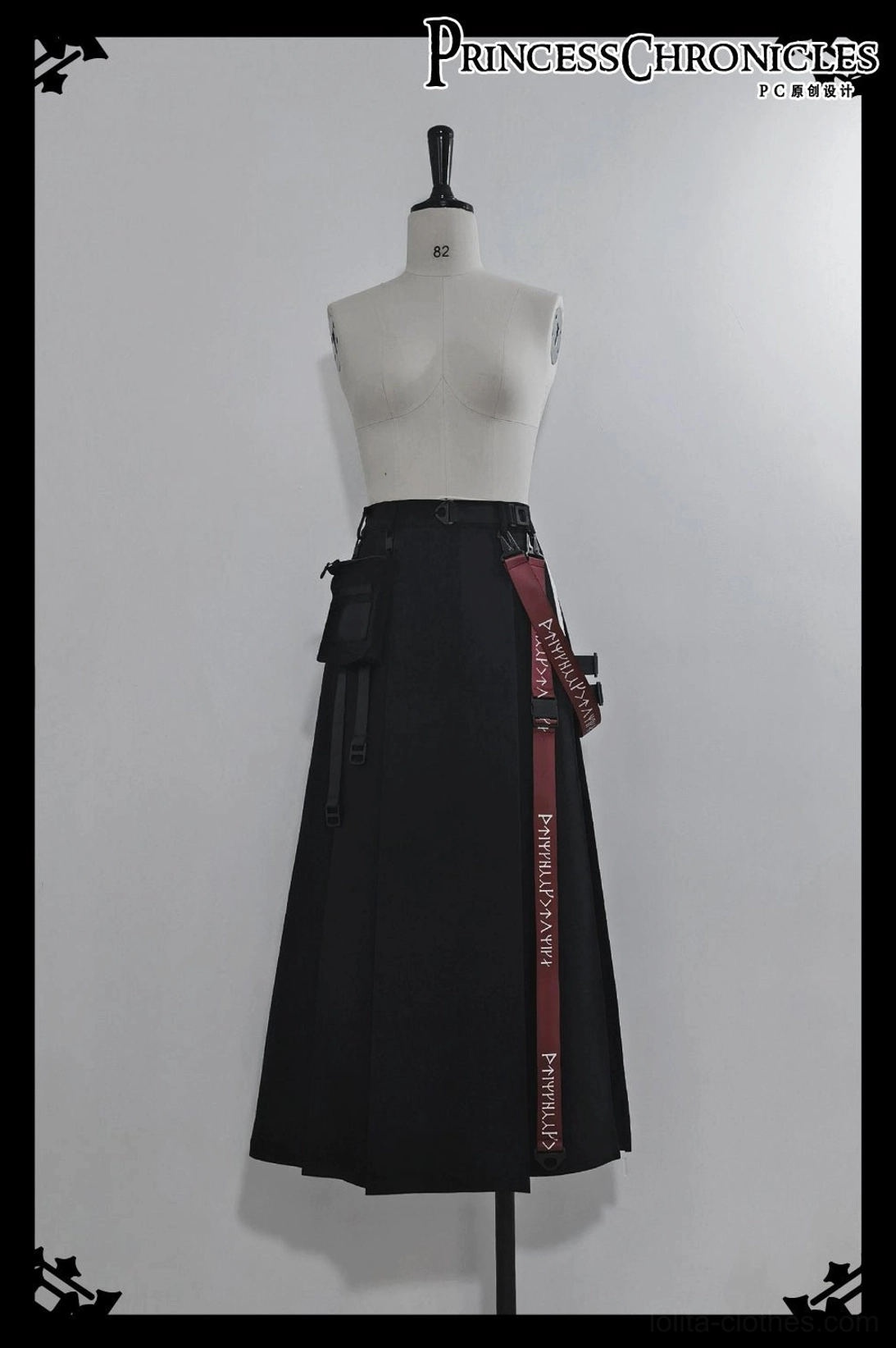 Noir utility A-line techwear skirt with integrated inner shorts front view on dress form studio display