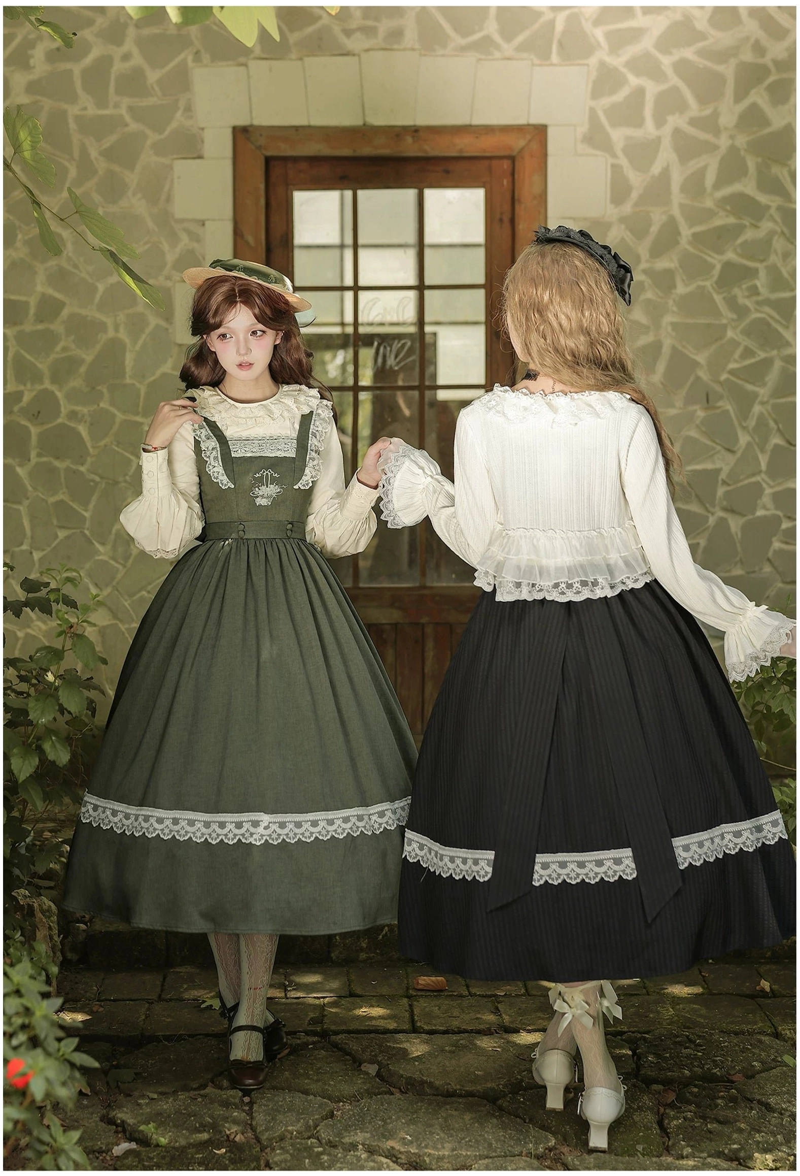 Front and back view comparison of lolita outfits showing sage green and black JSK dress designs with square neckline and lace trim, outdoor stone wall doorway setting