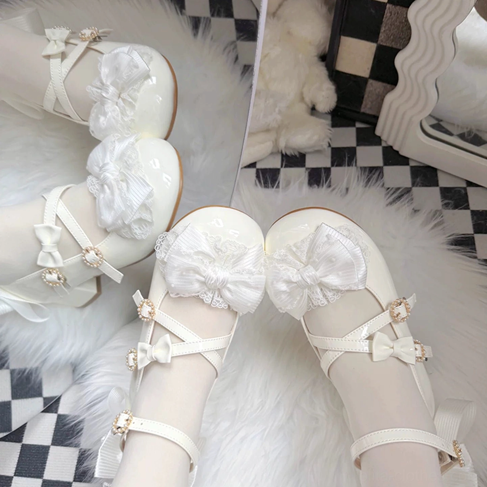 Off-white glossy Lolita Mary Jane shoes overhead flat lay view on checkered fur mat showing ruffled toe bows dual adjustable ankle straps with gem buckles round block heel