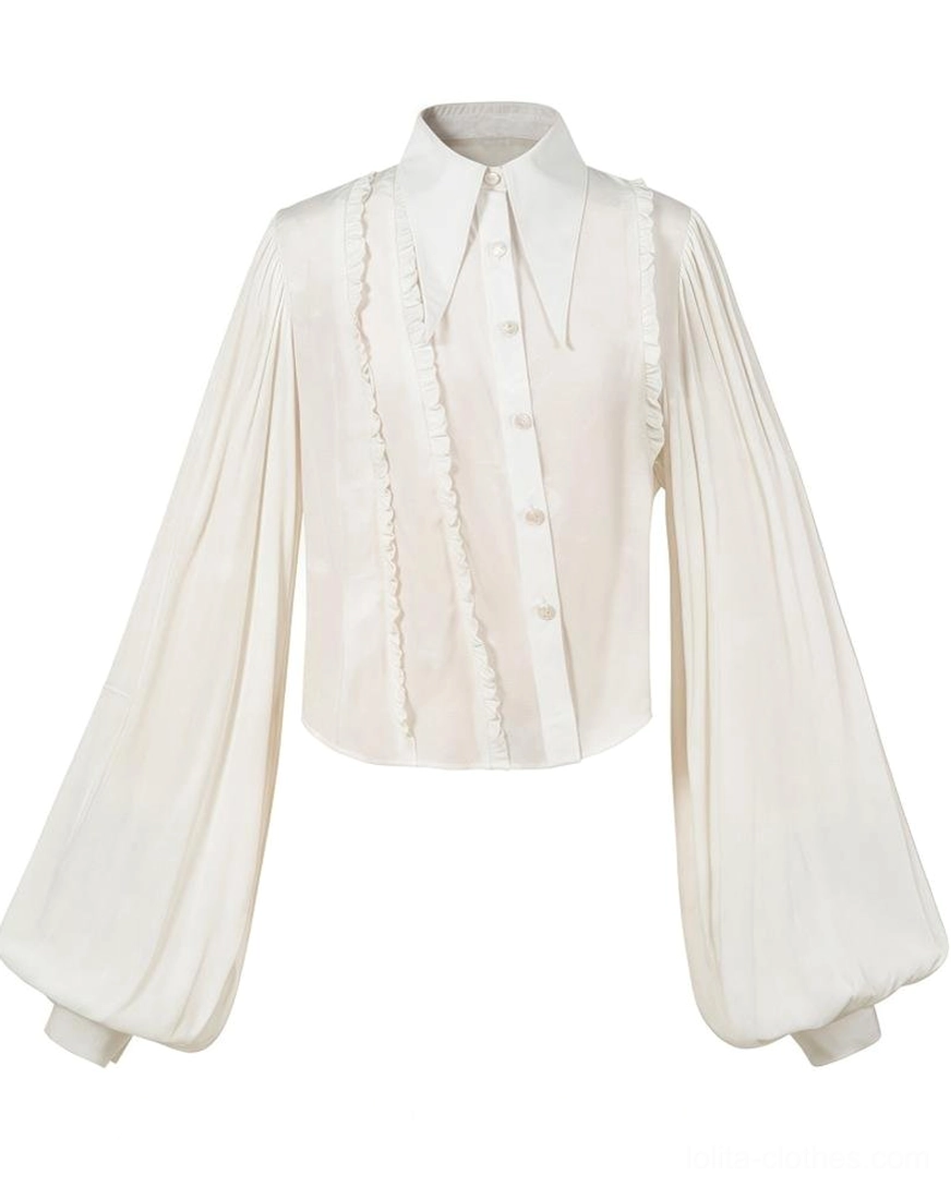 Off-white retro American style vintage Lolita blouse flat lay front display with oversized puff sleeves and tonal dark embossed fabric patterns pointed collar detail