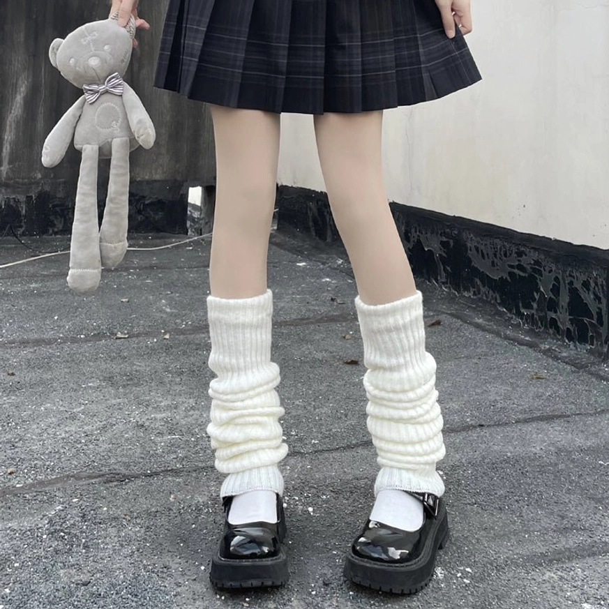 Off-white thigh-high slouch lolita leg warmers in ribbed knit fabric front full view legs plaid jk skirt